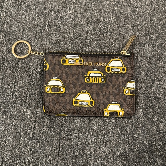 Michael Kors keychain wallet
BRAND NEW ! 
Cute taxi detail - Picture 4 of 4